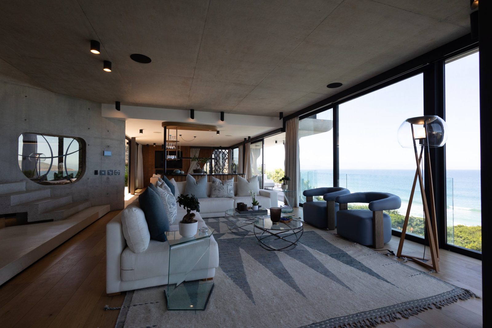 Ocean-view living room before editing
